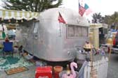 Cool 1957 Airstream Flying Cloud Trailer With Fun Accessories at The Beach